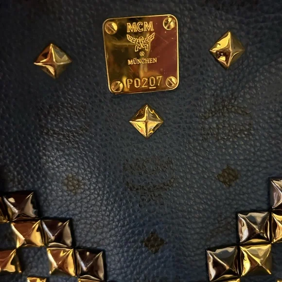 AUTHENTIC blue MCM Stark backpack with studs